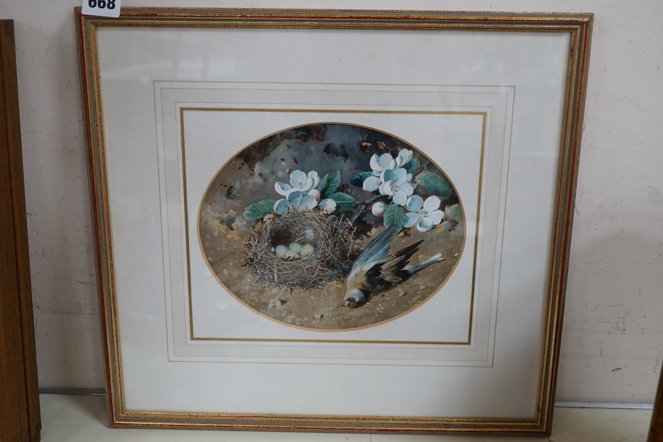 William Cruikshank (1849-1922), watercolour and gouache, Still life of blossom, a birds nest and dead goldfinch, signed, oval, 19 x 23cm